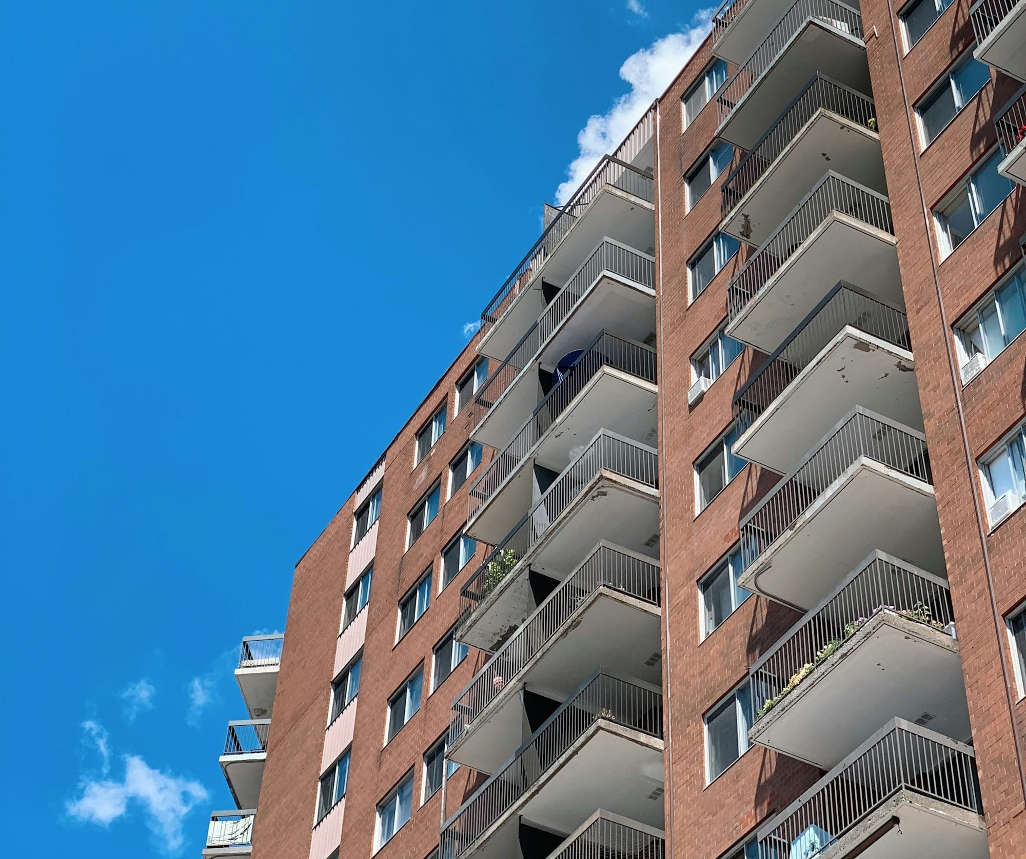 brown concrete building under blue sky during daytime