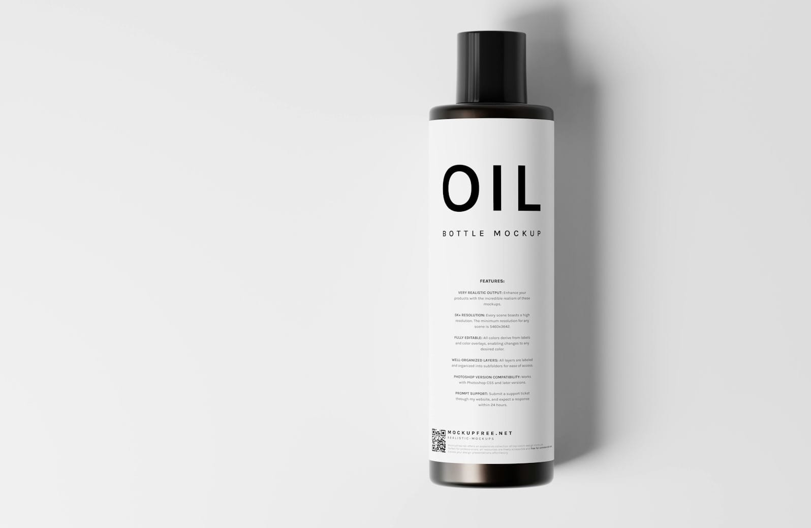 a bottle of oil on a white surface