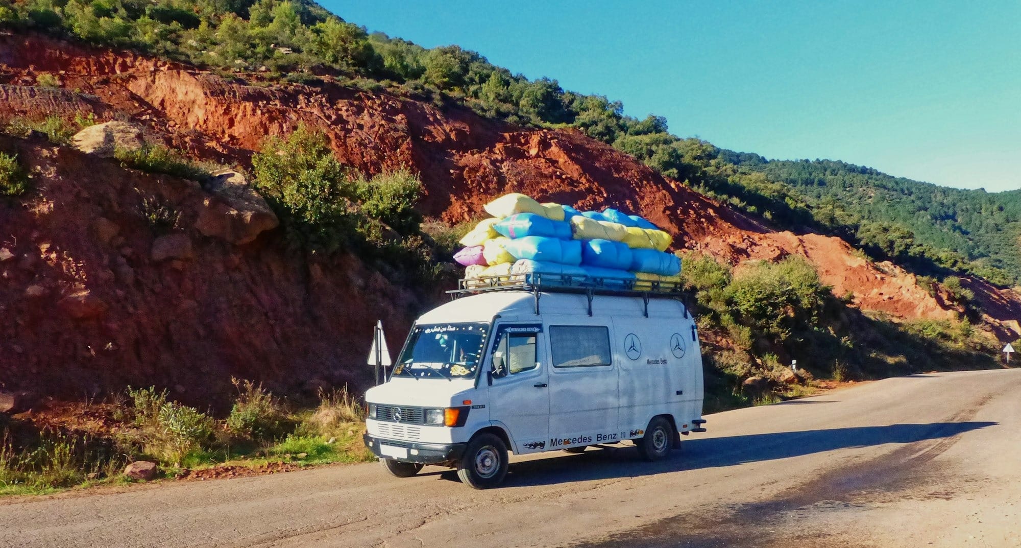 white van on road during daytime